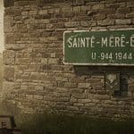 Le Mystère du Panneau Historique de Sainte-Mère-Église Résolu