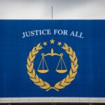 Bannière Géante Trump au Ministère Justice : Polémique