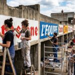 RPlanning the article structureenaissance des Enseignes sur le Circuit de Gueux : Étudiants Artistes au Travail